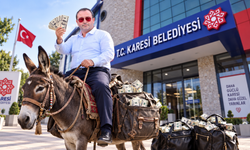 Balıkesir Bunu Konuşacak! İzzet Tığlı’dan Sıra Dışı Ağalık Bedeli Protestosu! Parayı Belediyeye Katırla Getirecek